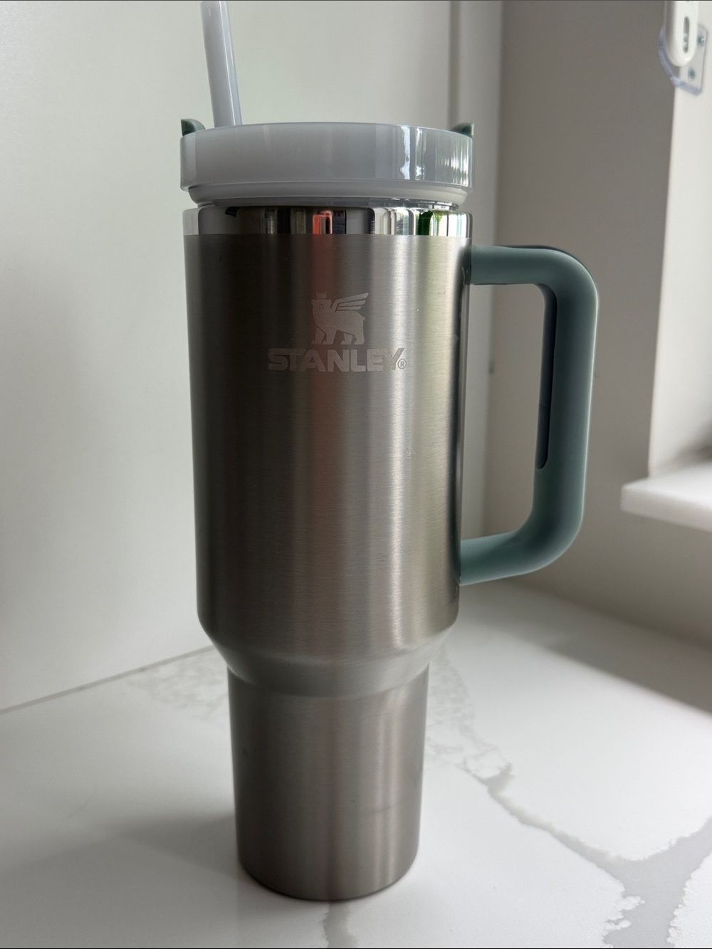 Stanley Silver Tumbler with Seafoam Green Handle and White Lid